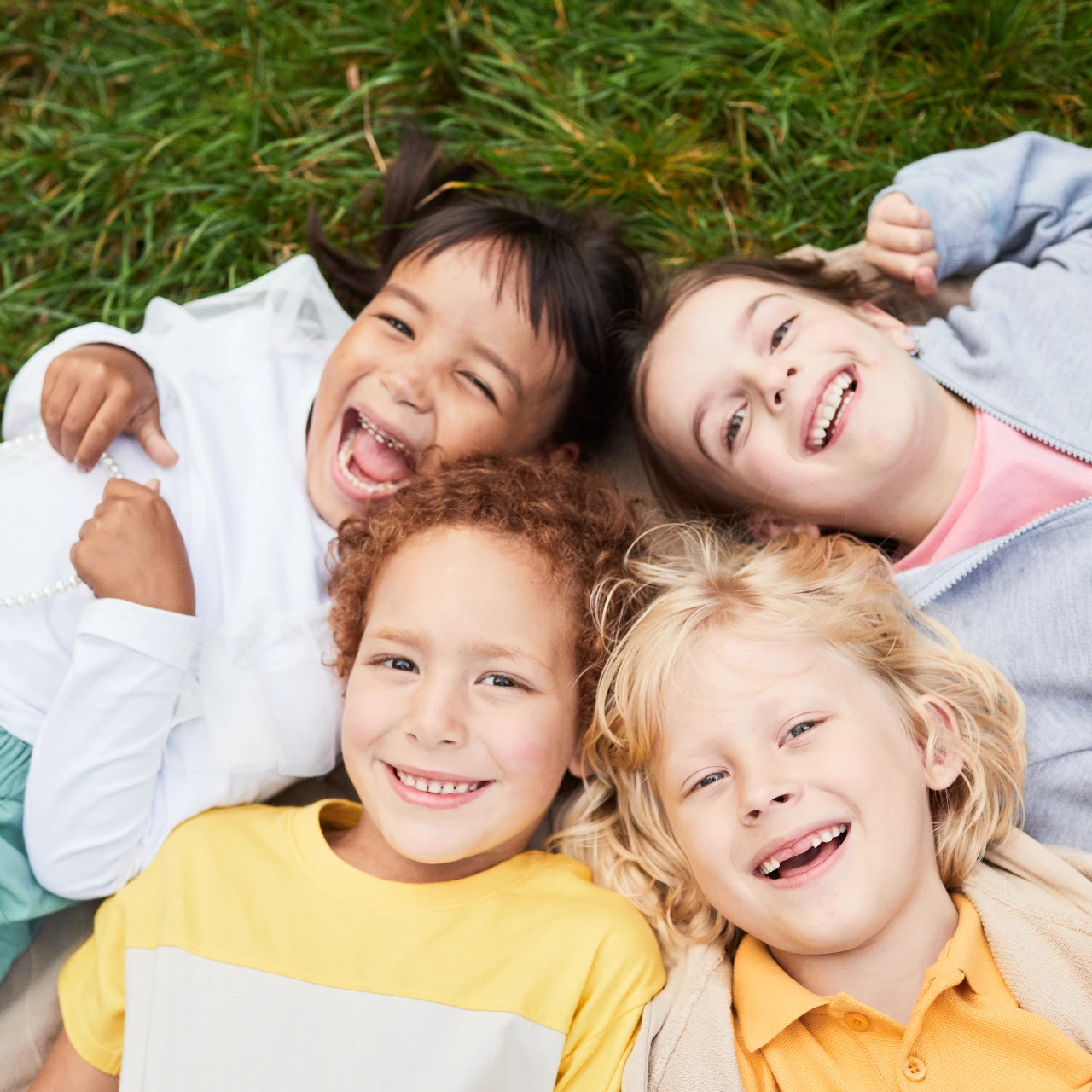 group of children smiling | pediatric dentistry orange county