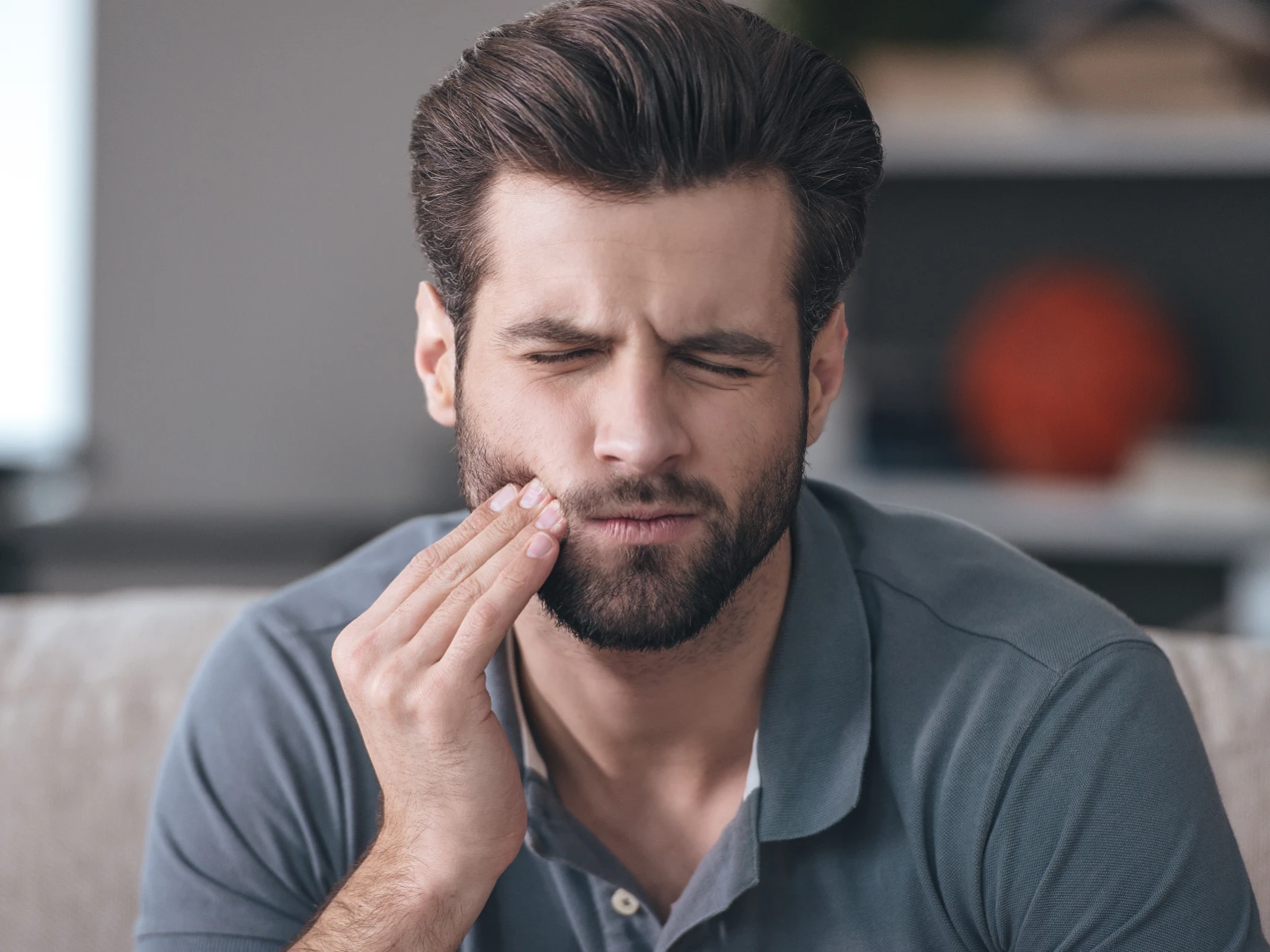 main in pain from a toothache | emergency dentist orange county